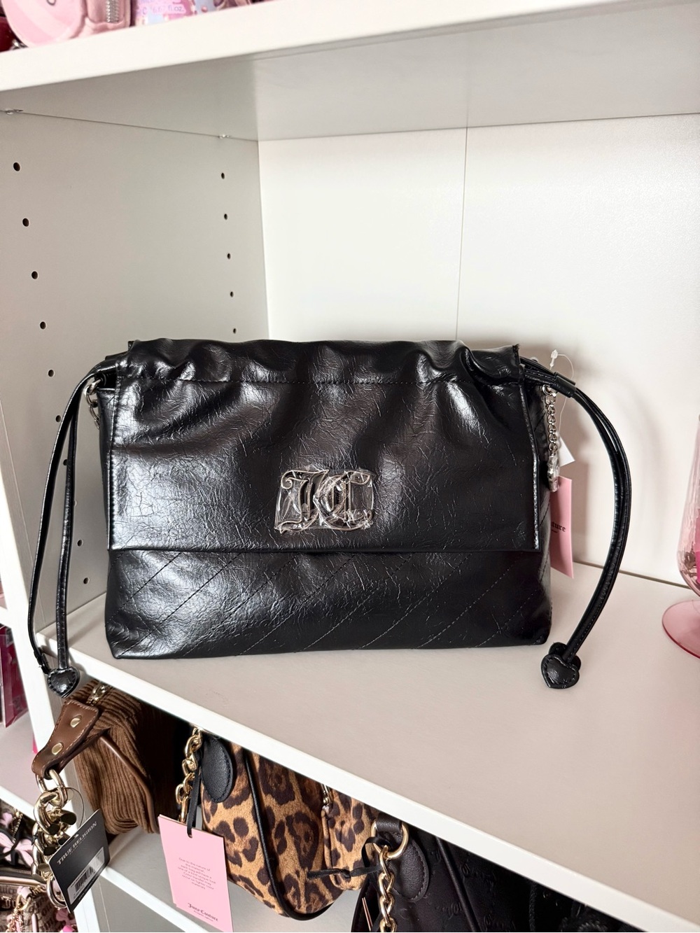 Juicy Couture “Soft Spoken” Black Quilted Shoulder Bag with Silver Logo